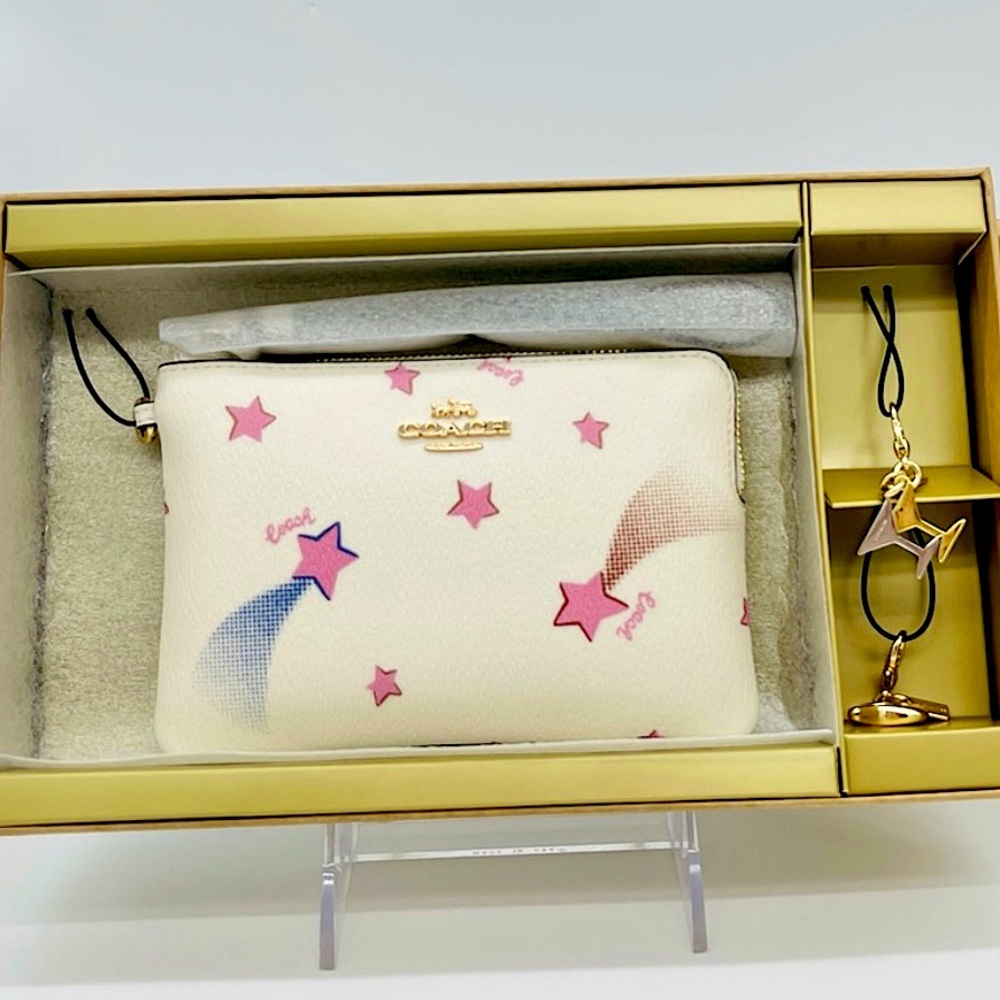 Coach Zip Wristlet with Disco Star Design